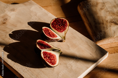 Figs on wooden cutting board photo
