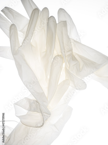 Used latex glove transparent on white background