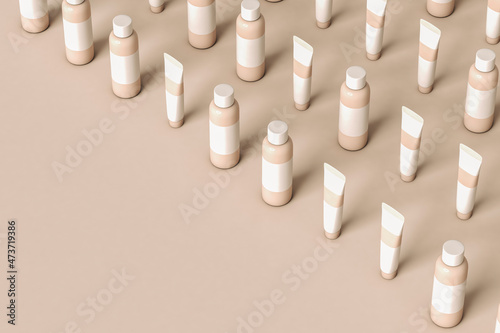 makeup containers standing on a beige background  photo