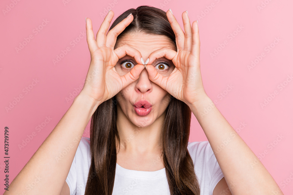 Portrait of attractive cheerful girl showing double ok-sign looking specs pout lips isolated over pink pastel color background Portrait of attractive cheerful girl showing double ok-sign looking specs pout lips isolated over pink pastel color background