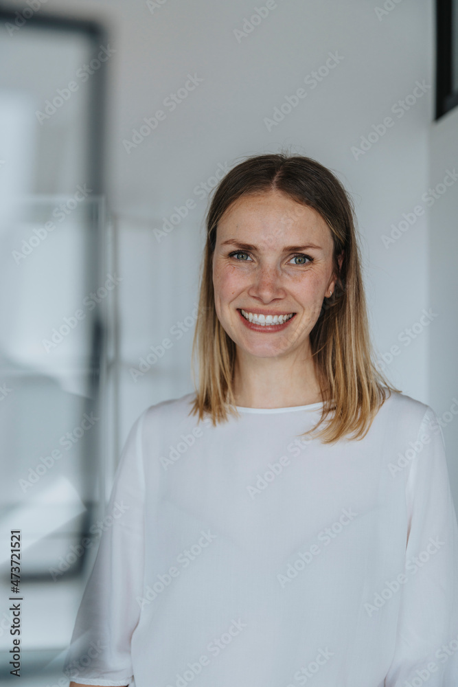 Smiling woman standing Smiling woman standing