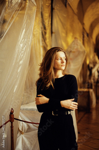 Portrait of young woman in museum