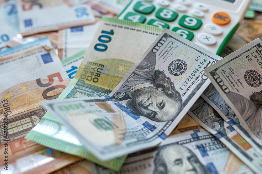 calculator on dollar and the euro bills, exchange money calculator on dollar and the euro bills, exchange money