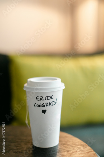 Funny, Misspelled Note on Coffee Cup photo