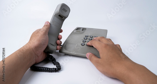 A wired telephone (or telefon) is a telephone connected to the public switched telephone network (PSTN) by a wire called a wireline. The wired telephone is one of the most iconic inventions. photo