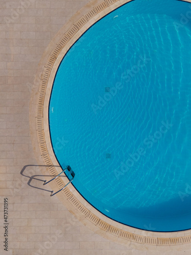round swimming pool top view with copyspace