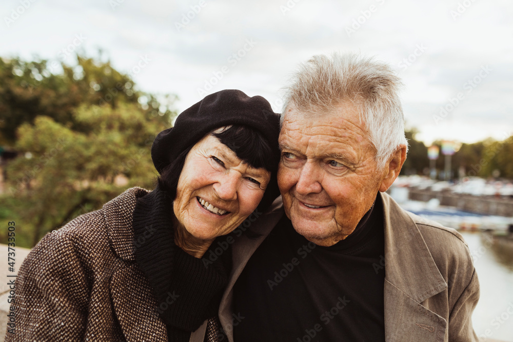 Portrait of smiling senior woman with man during vacation Portrait of smiling senior woman with man during vacation