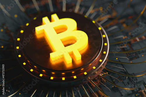 Bitcoin symbol surrounded by electrical components photo