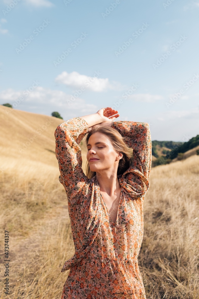 Young Woman Posing Outdoors in Nature Young Woman Posing Outdoors in Nature