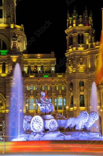 Close-up of the La Cibeles fountain with the town hall, at night at Christmas, Madrid, Spain, Europe, November, 30, 2021, vertical