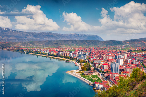 Impressive spring cityscape of Pogradec town. Beautiful outdoor scene of Ohrid lake. Superb morning view of Albania, Europe. Traveling concept background. photo