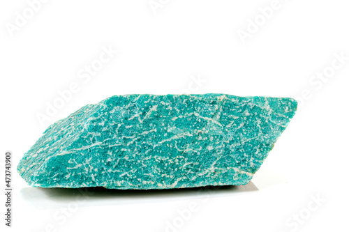 Macro of mineral stone amazonite on white background photo