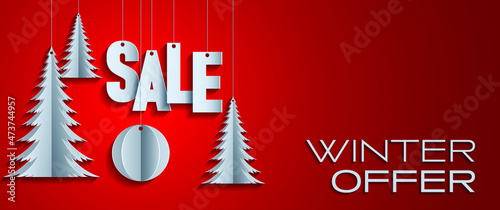 Banner of sales of winter offers. Vector illustration of a winter sale advertisement in the style of Christmas decorations cut out of white paper on a red background.