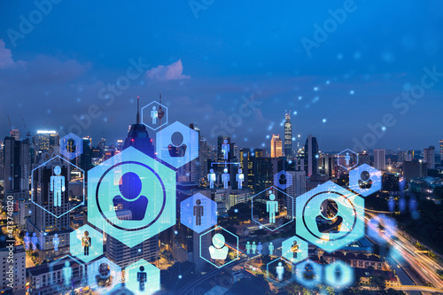 Photography Glowing social media icons on night panoramic city view of Kuala Lumpur, Malaysia, Asia