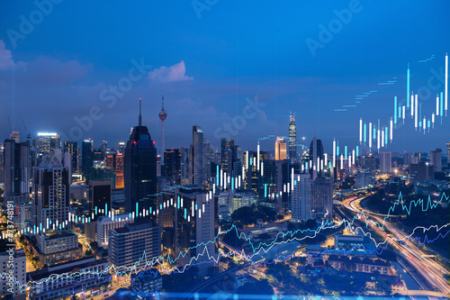 Canvas Print Stock market graph hologram, night panorama city view of Kuala Lumpur