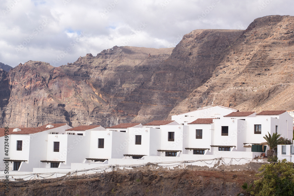 Los Gigantes, The view of famous cliffs and spanish architecture, Tenerife, Canary Islands, Spain. Los Gigantes, The view of famous cliffs and spanish architecture, Tenerife, Canary Islands, Spain.