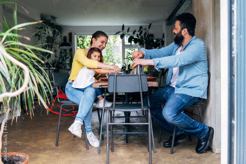 Family having breakfast together at home Family having breakfast together at home