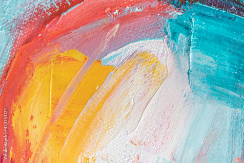 The background is written in acrylic. Painting in multicolored tones. Closeup of a painting by oil and palette knife on canvas.