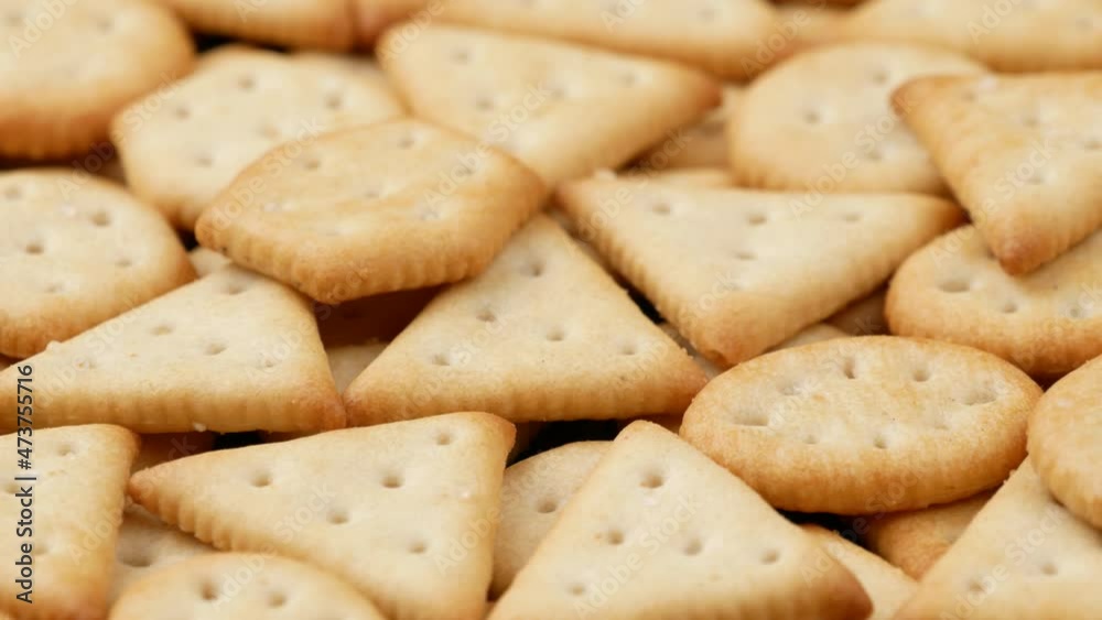 Salty cracker, side view. Cracker of different shapes, dolly shot. Salty cracker, side view. Cracker of different shapes, dolly shot.