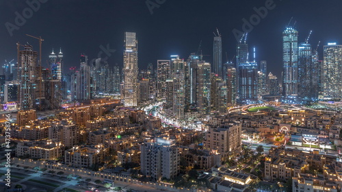 Dubai's business bay towers aerial night timelapse. Rooftop view of some skyscrapers © neiezhmakov