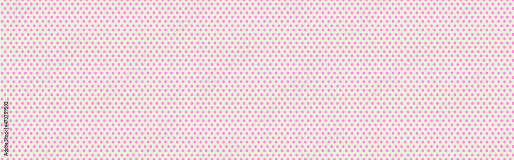 Seamless vector pastel pattern with dark pink polka dots on a sweet baby pink background.
