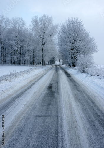 Icy and snowy weather, hazardous road and driving conditions, traffic disruption  © burnstuff2003