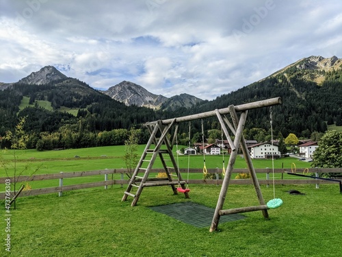 Kinder Playground with mountain view in Alps Austria