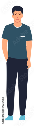 Smiling young man standing. Happy student concept