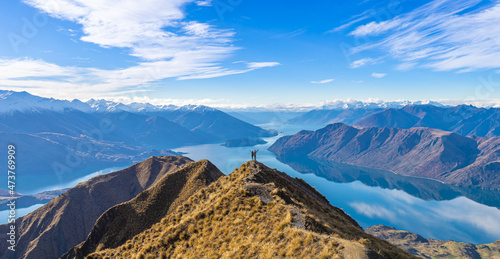 Canvastavla Young Asian couple celebrating success at Roy's Peak Lake Wanaka New Zealand