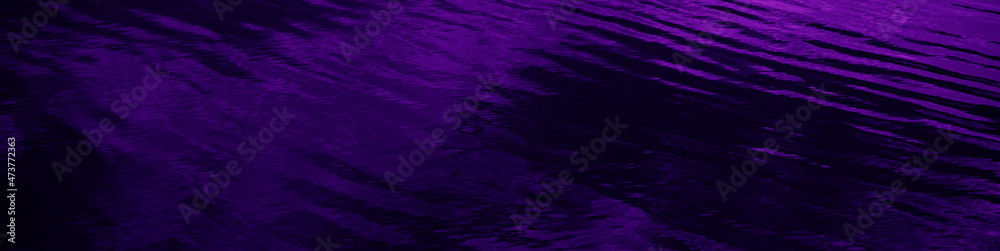 Deep purple abstract background. Toned water surface. Reflection of clouds and light. Water ripple background with copy space for design. Web banner. Website header.