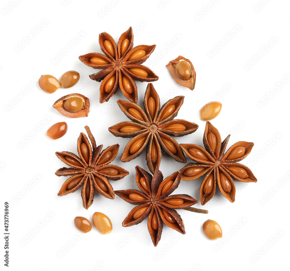 Dry anise stars with seeds on white background, top view Dry anise stars with seeds on white background, top view