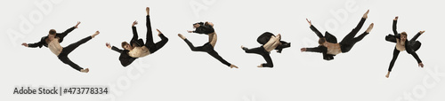 Collage made with one young man, contemp dancer in black business suit flying isolated on white background. Art, motion, action