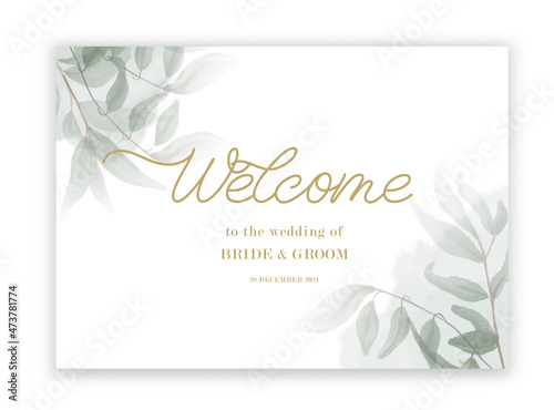 Welcome to the wedding of - wedding calligraphic sign with watercolor and green leaves.