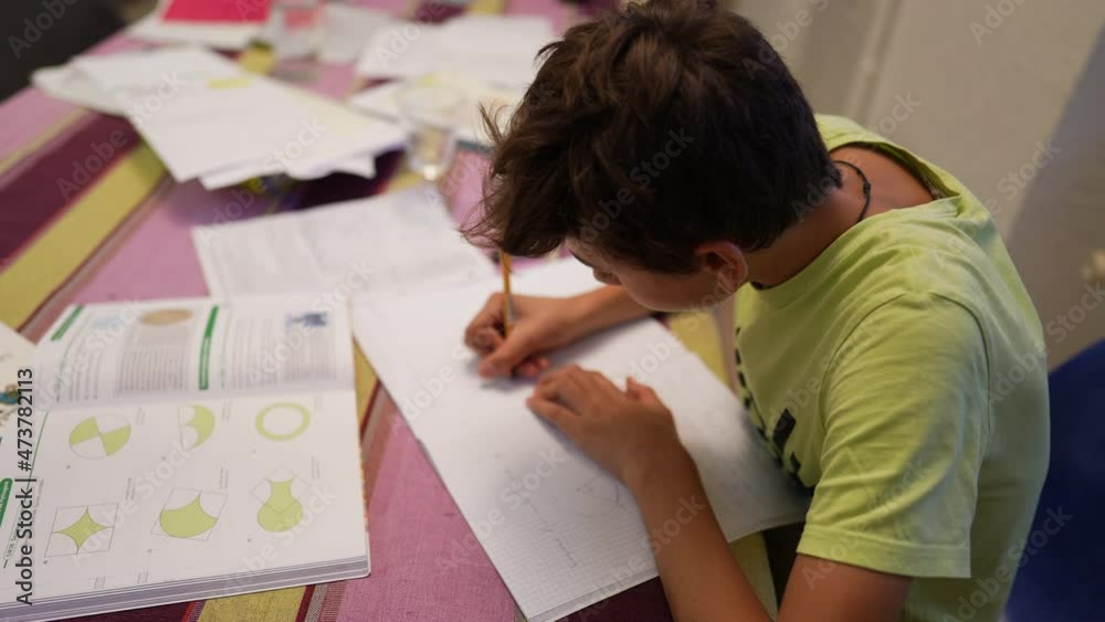 Young boy doing homework at home Young boy doing homework at home