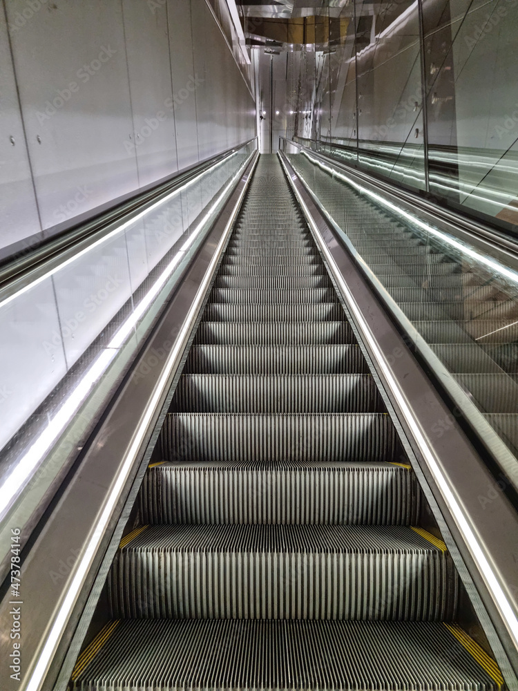 View of escalator stairs going up View of escalator stairs going up