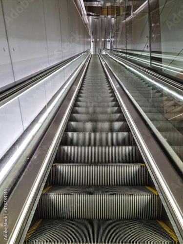 Fototapeta Naklejka Na Ścianę i Meble -  View of escalator stairs going up