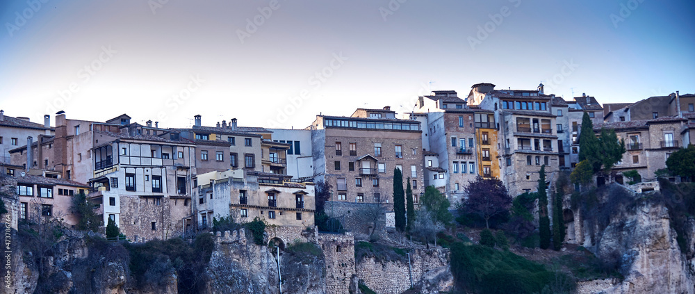 A view of the medieval hanging houses built on the edge of the cliff, in the city of Cuenca, Spain.