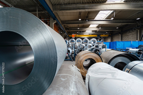 Metal sheet rolls in factory
