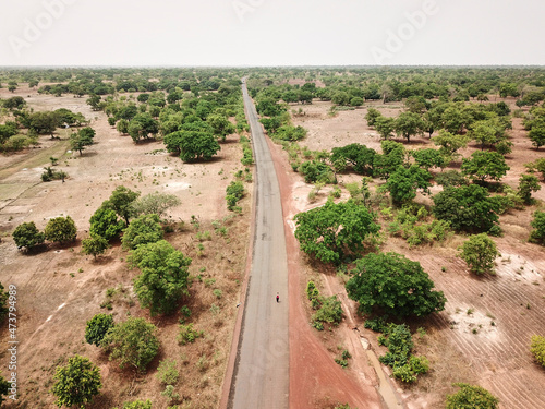 Mali, Bougouni, Aerial view of RN7 road across arid Sahel zone photo