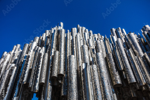 steel pipes against blue sky