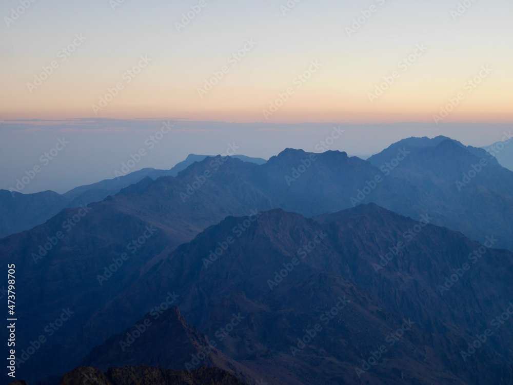 Obraz premium Amazing view from the top of Djebel Toubkal, North Africa's highest mountain, at sunrise. Morocco.