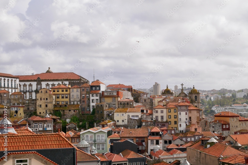 Panoramic view of Porto skyline, old town with traditional colorful houses and churches. Portugal.