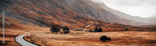 Winding road panoramic surrounded by the mountains of Glencoe, Scotland