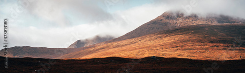 Fototapeta Naklejka Na Ścianę i Meble -  Glencoe mountain covered in mist in the Scottish countryside