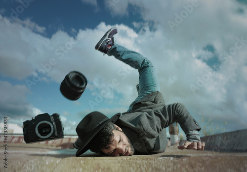 photographer having an accident with his camera 