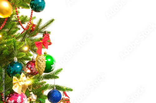 branches of a decorated Christmas tree on a white background , isolated.