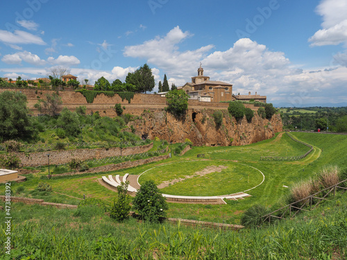 Traditional Italian landscape with cloudy blue sky. Cathedral Santa Maria Maggiore or S. Maria di Pozzano in Piazza del Duomo. Hill town Civita Castellana, province of Viterbo, Lazio region, Italy.