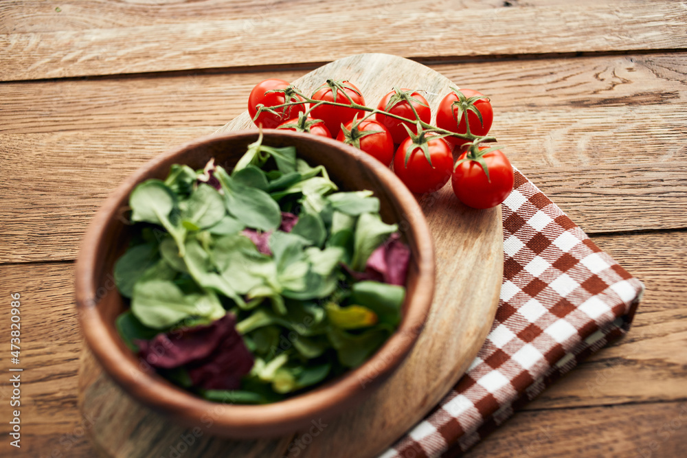 salad plate vegetables fresh ingredients wooden table kitchen salad plate vegetables fresh ingredients wooden table kitchen