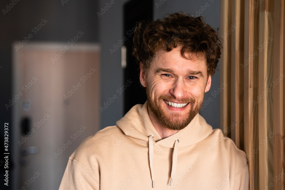 Smiling mid adult man at home Smiling mid adult man at home