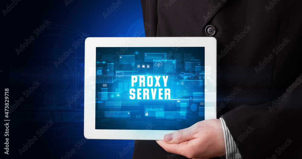 Person holding tablet, security concept Person holding tablet, security concept
